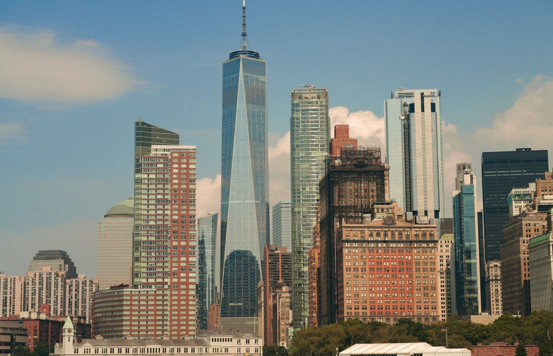 Impressive cityscape of New York City featuring the iconic One World Trade Center amidst modern skyscrapers.